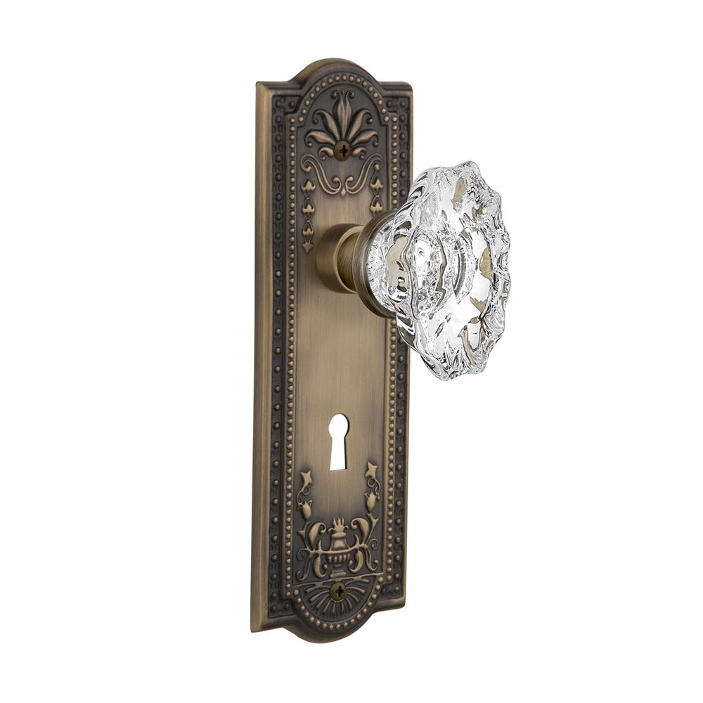Nostalgic Warehouse MEACHA Complete Mortise Lockset Meadows Plate with Chateau Knob in Antique Brass